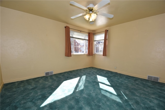 carpeted empty room with ceiling fan