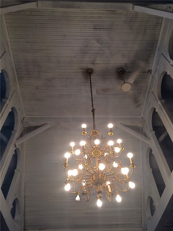 interior details featuring a notable chandelier