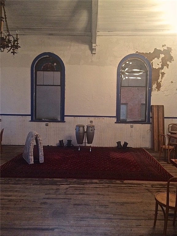 interior space with hardwood / wood-style floors and a chandelier