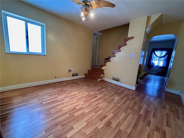 interior space featuring light hardwood / wood-style floors and ceiling fan