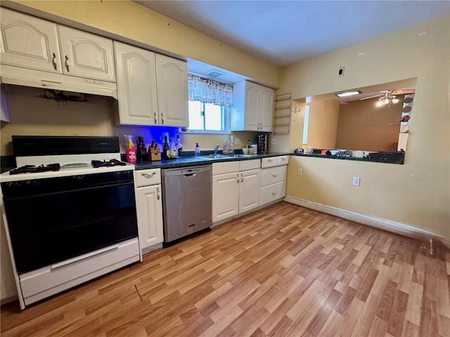 kitchen with white cabinetry, gas range gas stove, stainless steel dishwasher, and light wood-type flooring