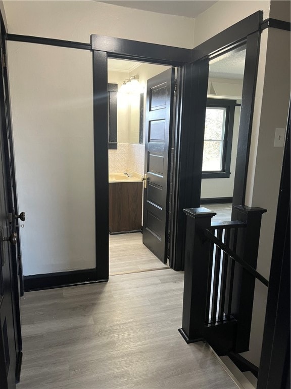 hallway featuring light hardwood / wood-style floors