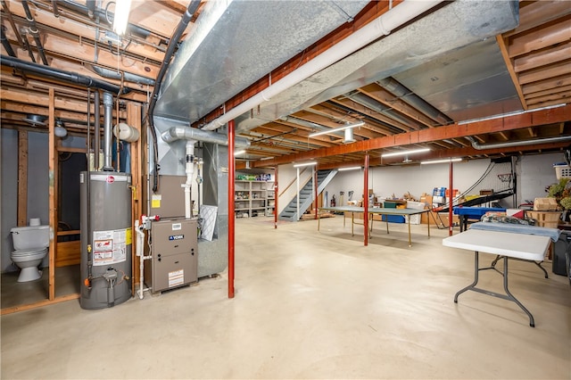 basement with heating unit and gas water heater