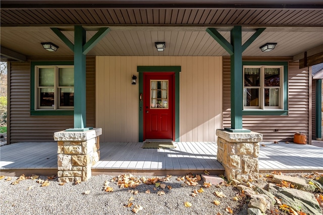 doorway to property featuring a porch