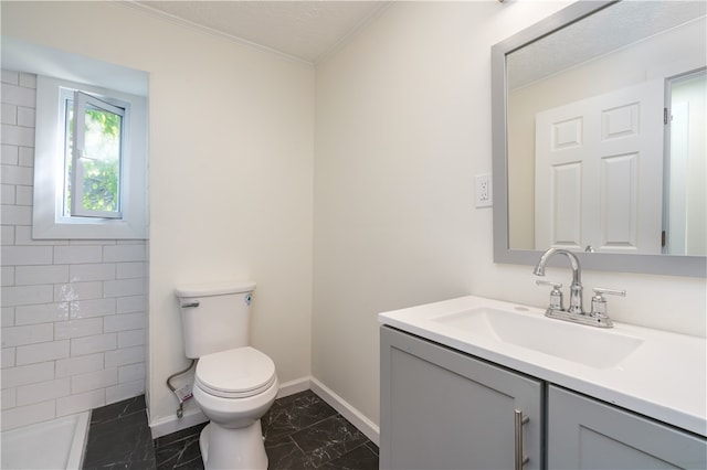 bathroom featuring a textured ceiling, a shower, toilet, vanity, and crown molding