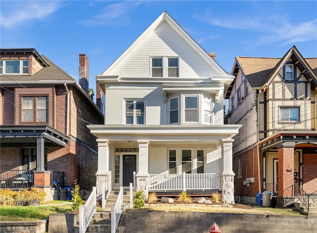 view of front of property featuring covered porch