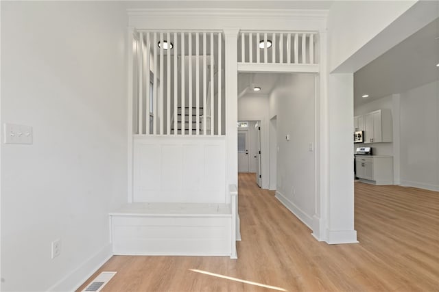 hall featuring light wood-type flooring