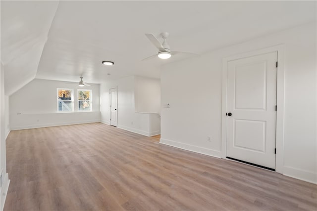 bonus room featuring ceiling fan, vaulted ceiling, and light hardwood / wood-style flooring