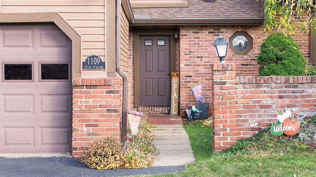 property entrance with a garage