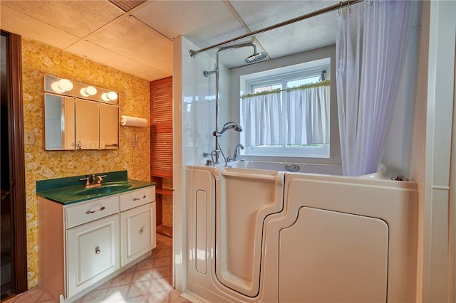 bathroom featuring vanity and a paneled ceiling