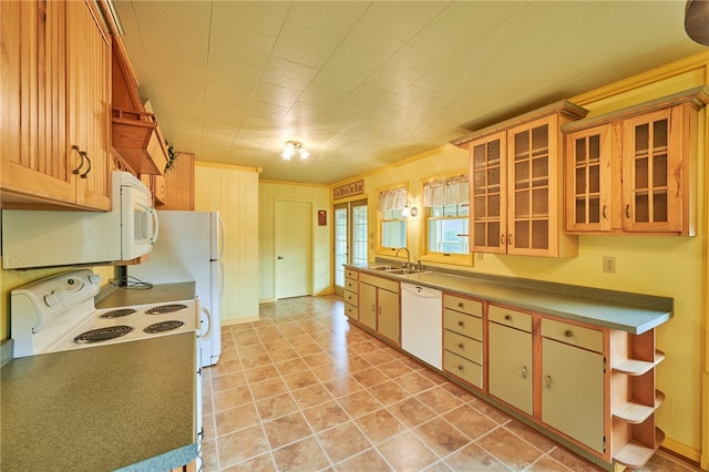 kitchen featuring sink and white appliances