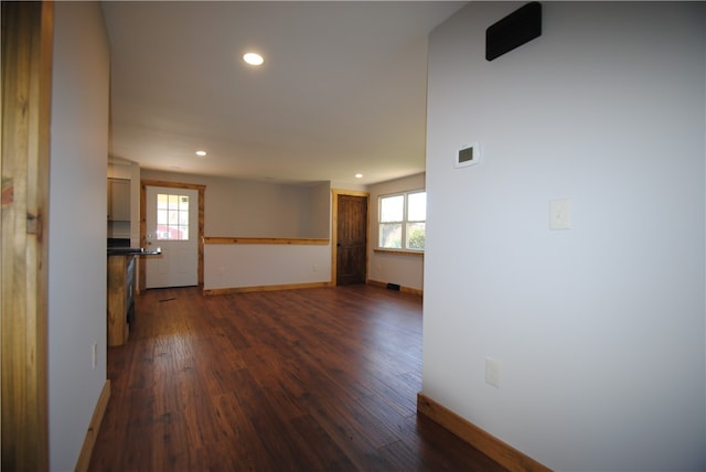 empty room featuring dark hardwood / wood-style floors