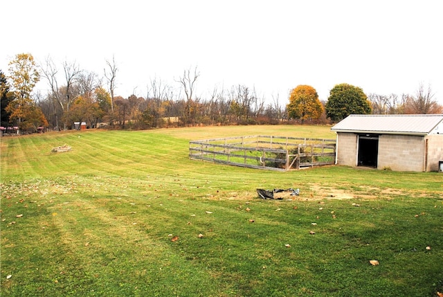 view of yard with a rural view