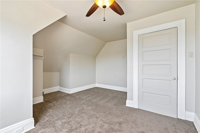 bonus room with lofted ceiling, carpet floors, and ceiling fan