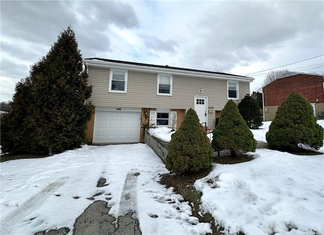 view of front of home with a garage