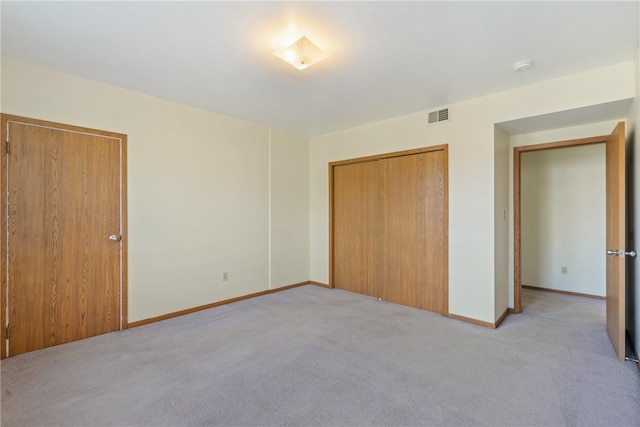 unfurnished bedroom with light carpet