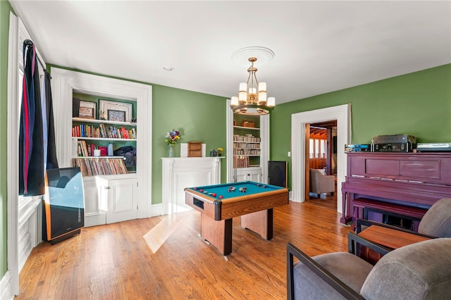 101 Fieldbrook Dr, Peters Twp, PA 15317 - playroom with a chandelier, billiards, and wood finished floors