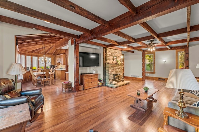 101 Fieldbrook Dr, Peters Twp, PA 15317 - living area with beamed ceiling, ceiling fan, baseboards, wood finished floors, and a chandelier