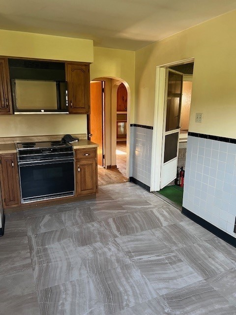 kitchen with black electric range oven