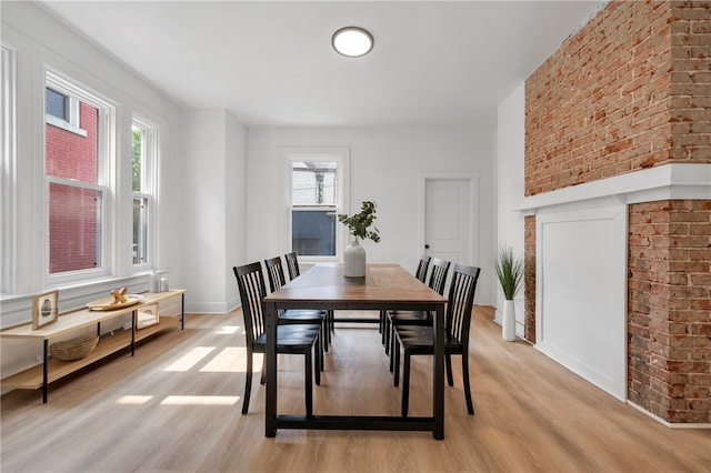 dining space featuring light hardwood / wood-style flooring