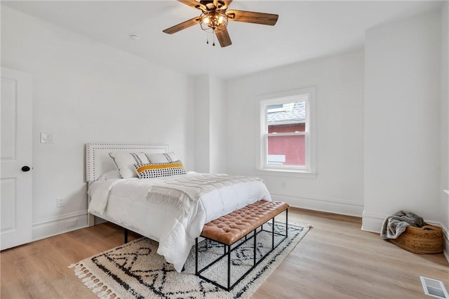 bedroom featuring ceiling fan and light hardwood / wood-style floors