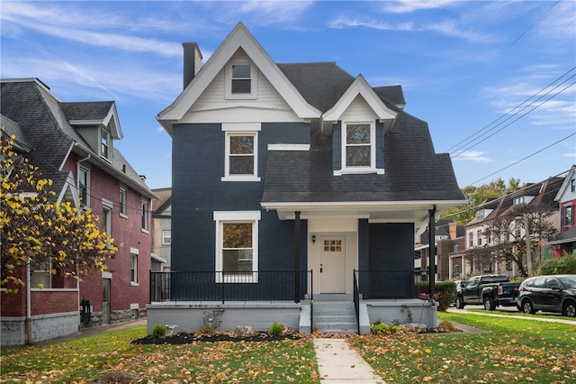 view of front facade featuring a front yard