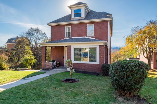 front facade featuring a front yard