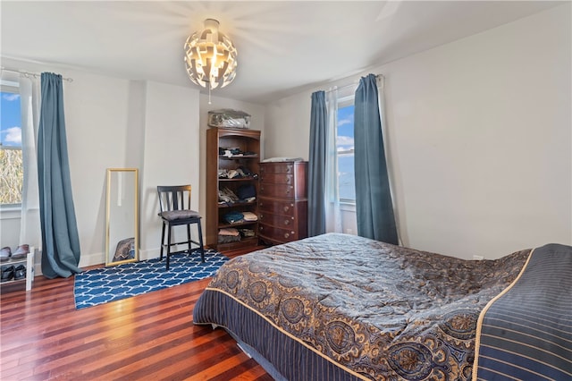 bedroom featuring dark wood-type flooring