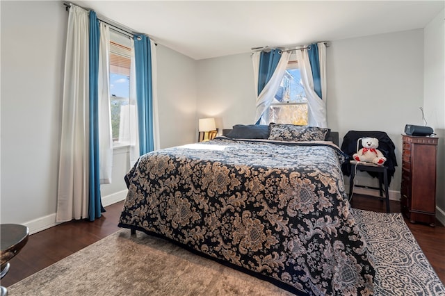 bedroom featuring dark hardwood / wood-style flooring