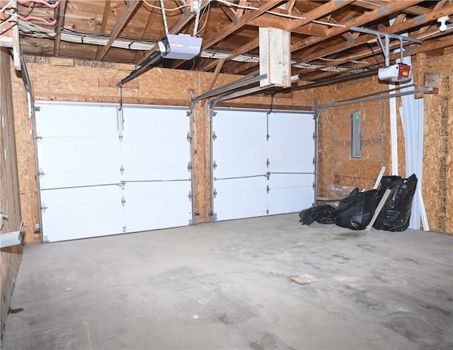 garage featuring a garage door opener