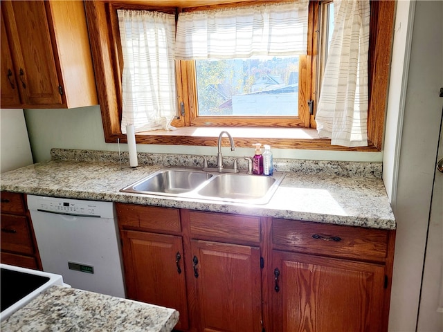 kitchen featuring sink and dishwasher