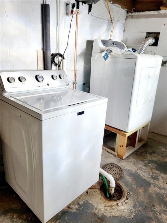 laundry room featuring washing machine and dryer