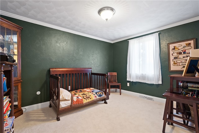 carpeted bedroom featuring crown molding