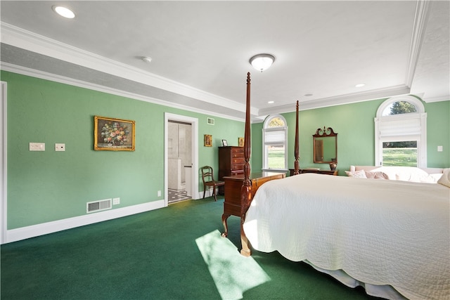 bedroom featuring dark colored carpet, a raised ceiling, multiple windows, and crown molding