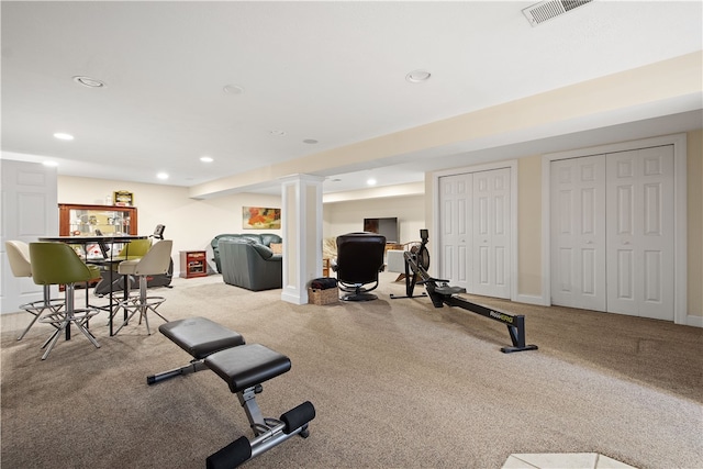 exercise area with light carpet