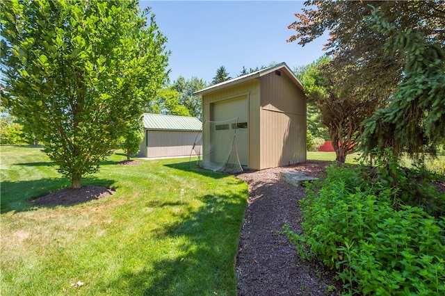 view of outbuilding featuring a yard