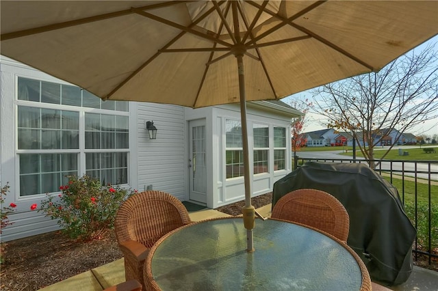 view of patio featuring a grill