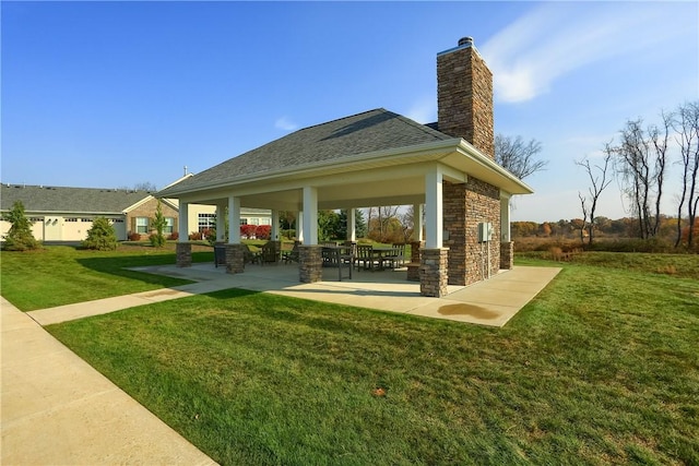 exterior space featuring a gazebo and a lawn