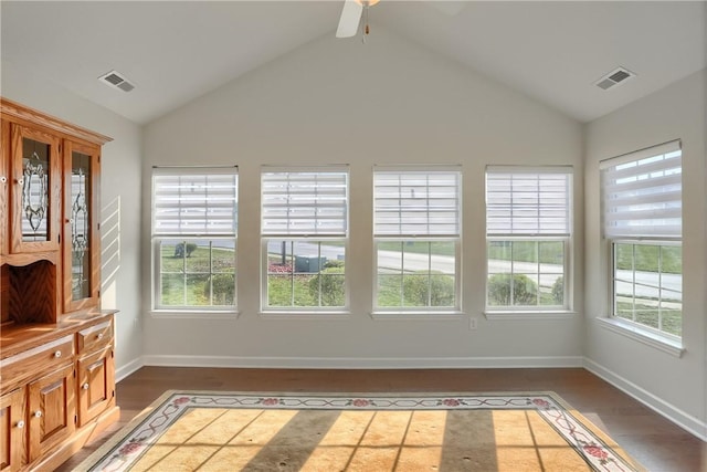 interior space with ceiling fan and vaulted ceiling