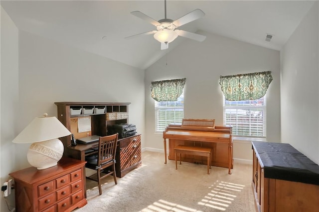 carpeted home office featuring ceiling fan, a healthy amount of sunlight, and high vaulted ceiling