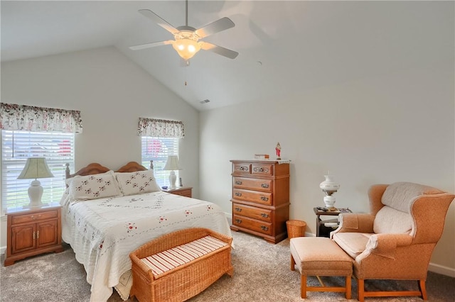 carpeted bedroom with ceiling fan, high vaulted ceiling, and multiple windows