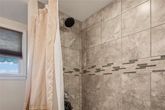 interior details featuring curtained shower