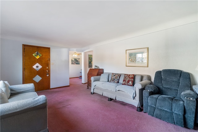 living room with ceiling fan and carpet flooring