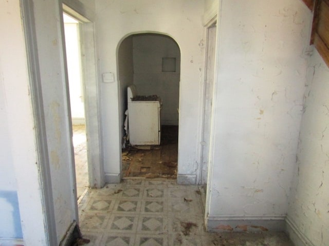 corridor with washer / clothes dryer