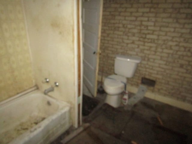 bathroom with toilet and plus walk in shower