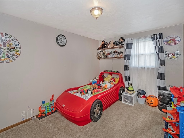 carpeted bedroom with a textured ceiling