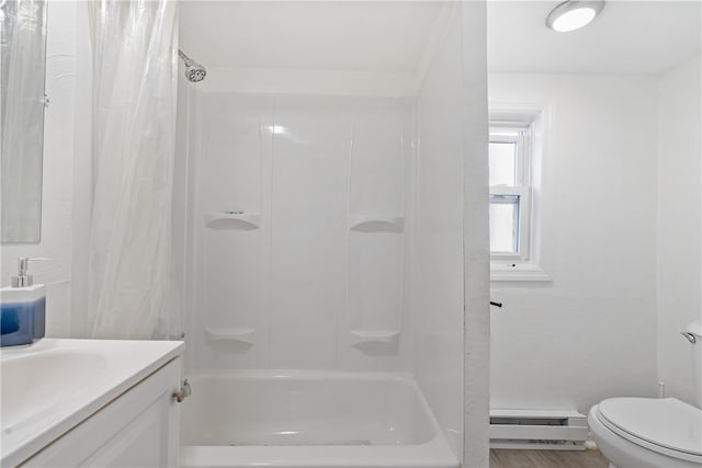 full bathroom with hardwood / wood-style flooring, shower / tub combo with curtain, vanity, a baseboard heating unit, and toilet