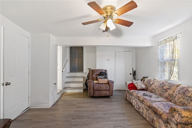 living room with hardwood / wood-style floors and ceiling fan