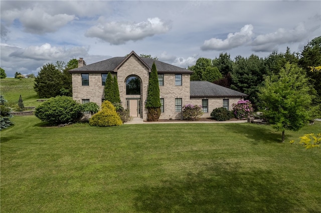 view of front of home with a front yard