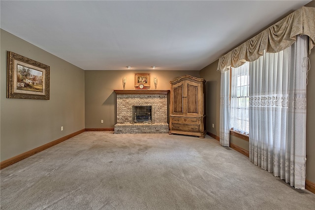 unfurnished living room with light carpet